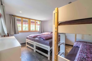 1 bedroom, desk, iron/ironing board, travel crib