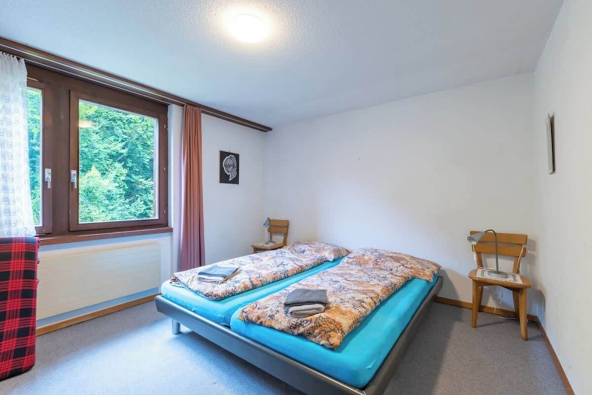 1 bedroom, desk, iron/ironing board, travel crib