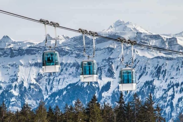 Cable car with panoramic views of the Swiss Alps in winter