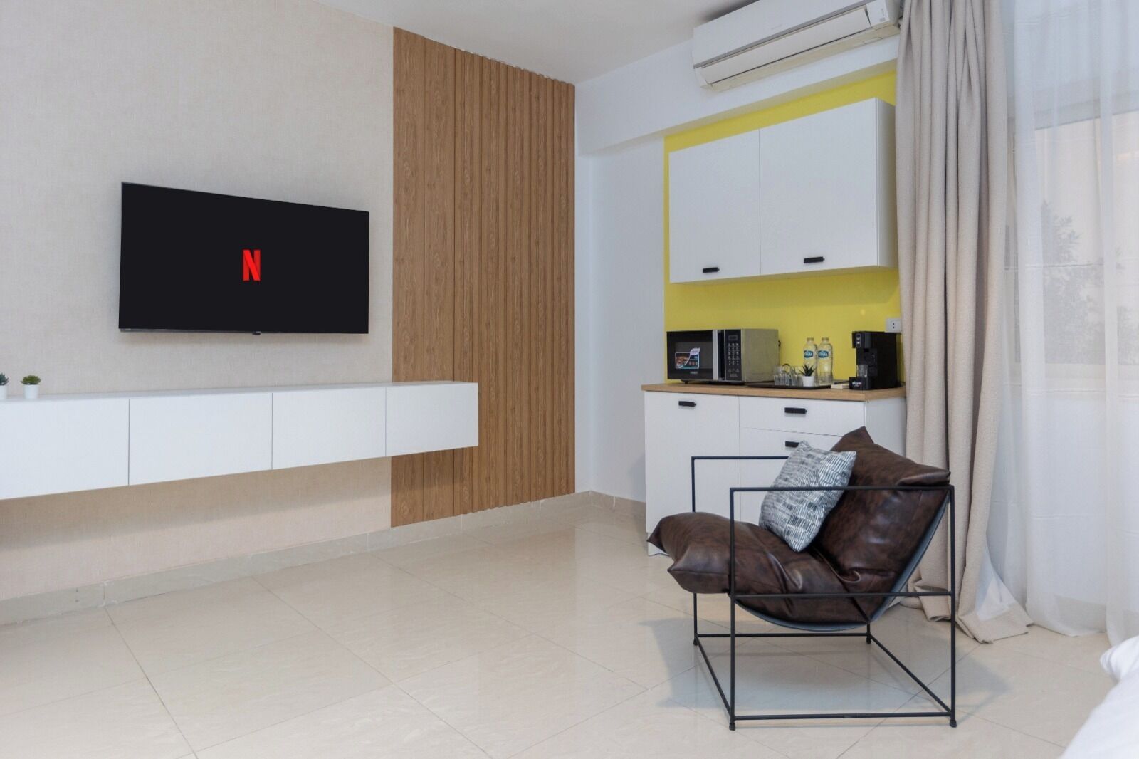 65-inch LCD TV with satellite channels, Netflix, streaming services