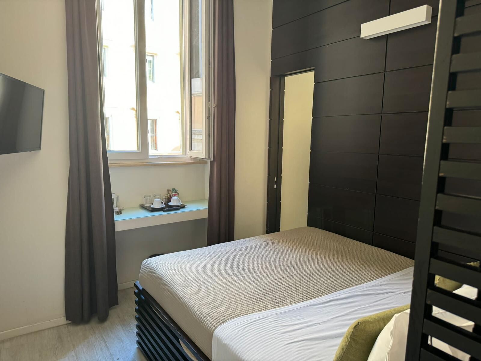 Family Quadruple Room, City View | In-room safe, iron/ironing board, free WiFi