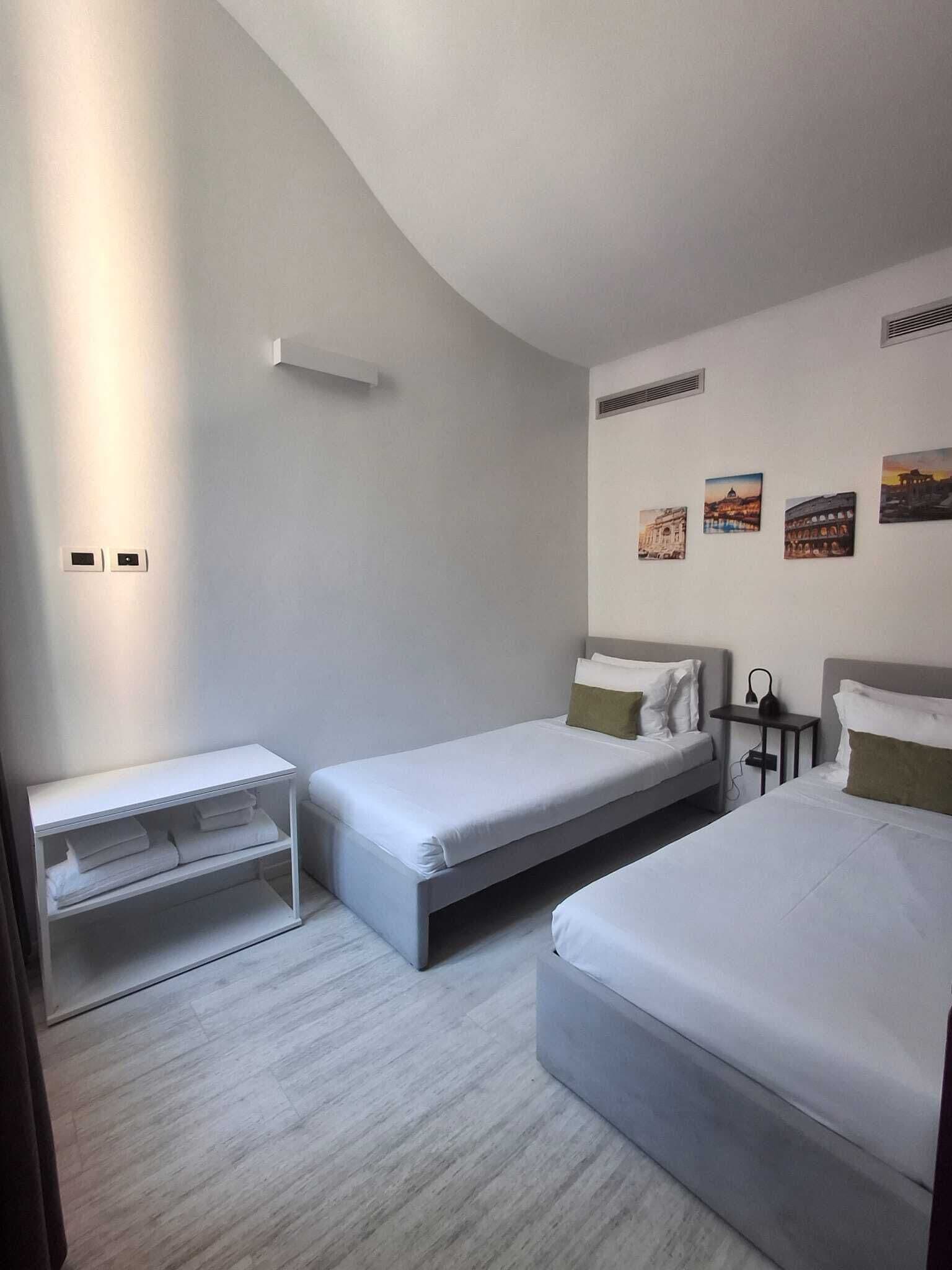 Family Quadruple Room, City View | In-room safe, iron/ironing board, free WiFi