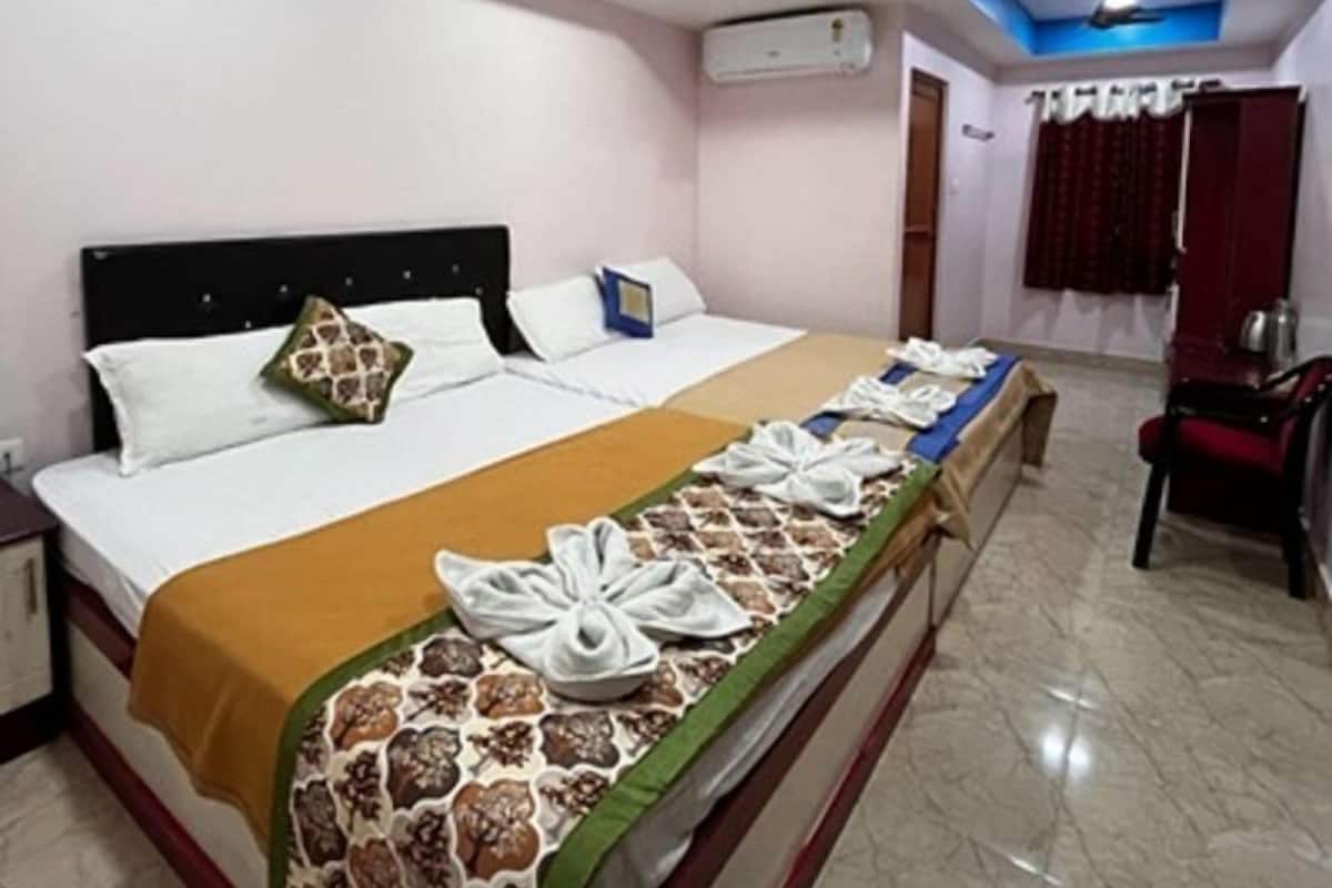 Habitación triple Deluxe | Escritorio, tabla de planchar con plancha y wifi gratis