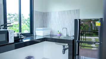 Fridge, microwave, cookware/dishes/utensils