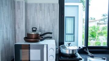 Fridge, microwave, cookware/dishes/utensils