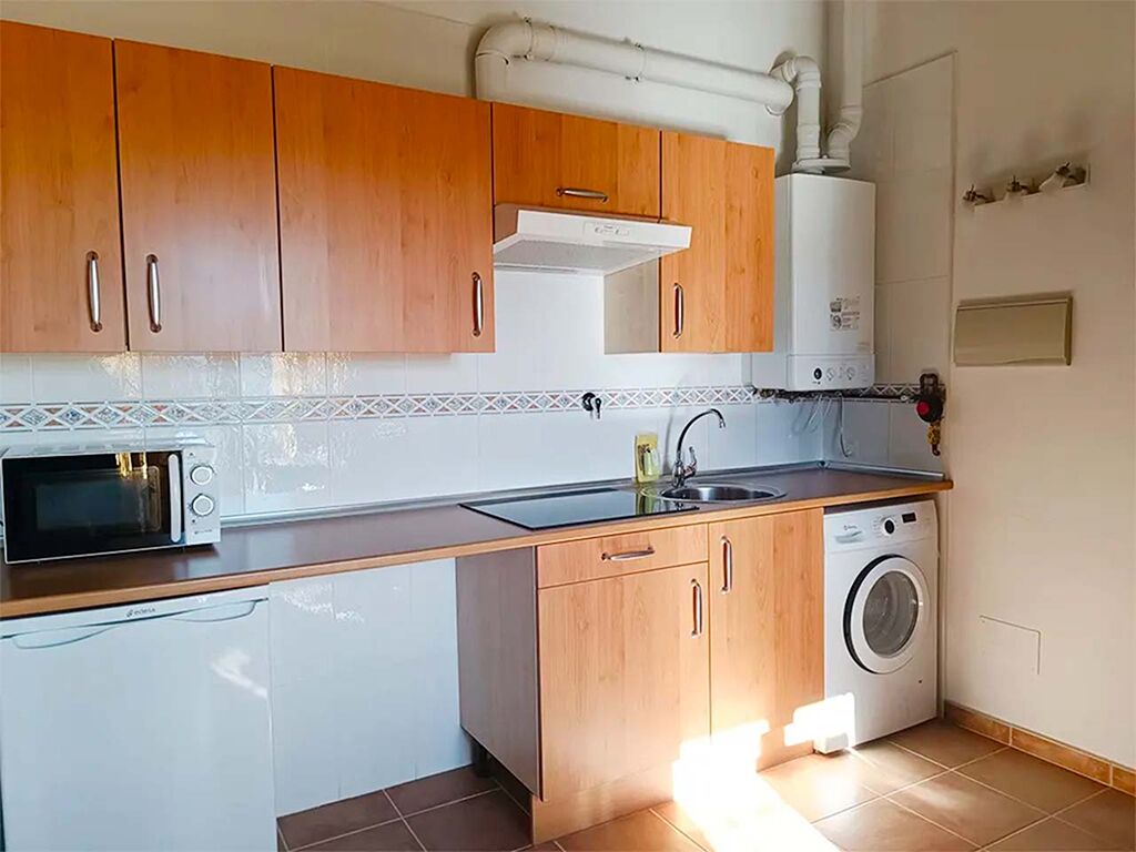 Fridge, microwave, stovetop, cookware/dishes/utensils