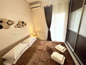 1 habitación, tabla de planchar con plancha, wifi y ropa de cama 