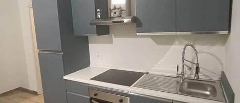 Fridge, stovetop, coffee/tea maker, cookware/dishes/utensils