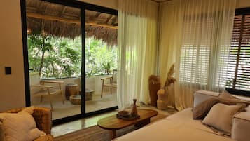 Departamento Confort, 2 habitaciones, alberca privada, vista al jardín | Salón ejecutivo