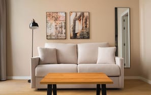 One-Bedroom Apartment with Terrace | Living area | 50-inch flat-screen TV with cable channels