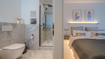 Shower, towels, soap, toilet paper