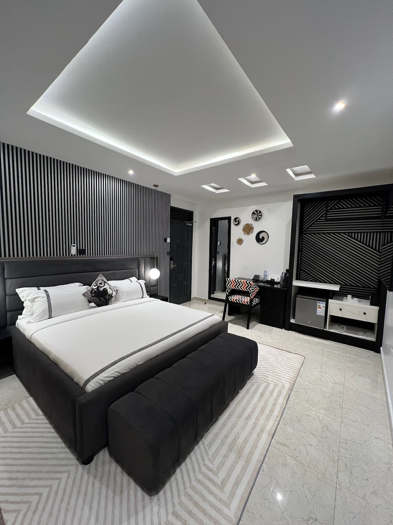Premium bedding, down comforters, memory foam beds, minibar