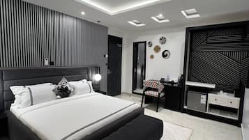 Premium bedding, down comforters, memory foam beds, minibar