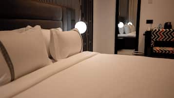 Premium bedding, down duvets, memory-foam beds, minibar