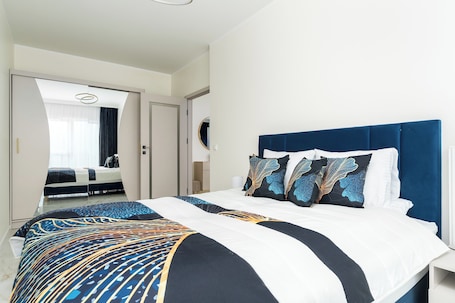 Tabla de planchar con plancha, cunas, wifi gratis y ropa de cama