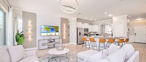 Televisio, DVD-soitin, pöytäjalkapallopöytä