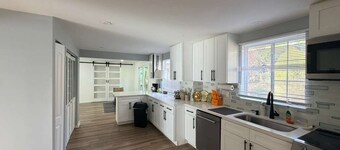 Experience a modern retreat with room for everyone! This 5-bedroom home offers a king suite, pool table, and fast Wi-Fi, making it ideal for family gatherings or group getaways