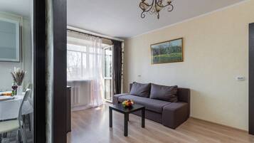 Classic Apartment, Balcony, Courtyard View | Living area | 40-inch LCD TV with digital channels