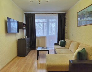 Classic Apartment, Balcony, Courtyard View | Living area | 40-inch LCD TV with digital channels - Apartment near Komarovsky Market (Minsk)