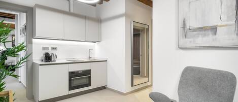 Fridge, oven, electric kettle, toaster