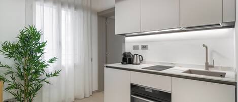 Fridge, oven, electric kettle, toaster