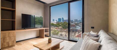 Apartment, 1 King-Bett und Schlafsofa, Balkon, Stadtblick (Piso Roma 7) | Wohnbereich