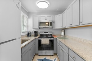 Fridge, microwave, oven, stovetop - Charming Beach Cottage Just Half a Block to the Sand (Panama City Beach)