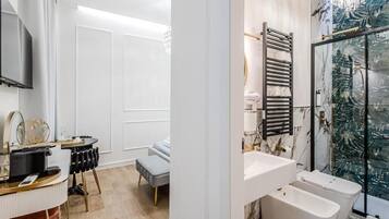 Junior Suite, 1 Queen Bed, Private Bathroom | In-room safe, desk, soundproofing, free WiFi