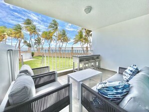 Terrace/patio - Beachfront 2-Bedroom Apartment in gorgeous Playa Azul Luquillo with AC and Pool (Luquillo)