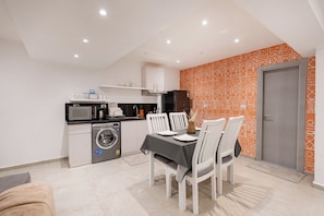 Apartment, 2 Bedrooms | Living area - Brassbell By Pyramids Near Grand Museum (Giza)