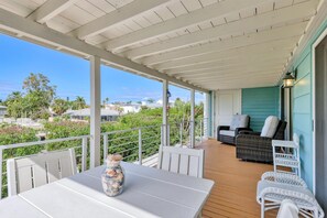 Outdoor dining - Salt Y Sol by FVC - 3 Bedroom, 3 Bath Pool/Canal Home (Longboat Key)