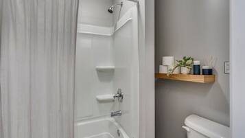 Hair dryer, towels, soap, shampoo