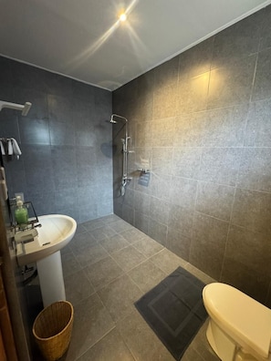 Family Double Room, Lagoon View | Bathroom | Shower, free toiletries, slippers, towels