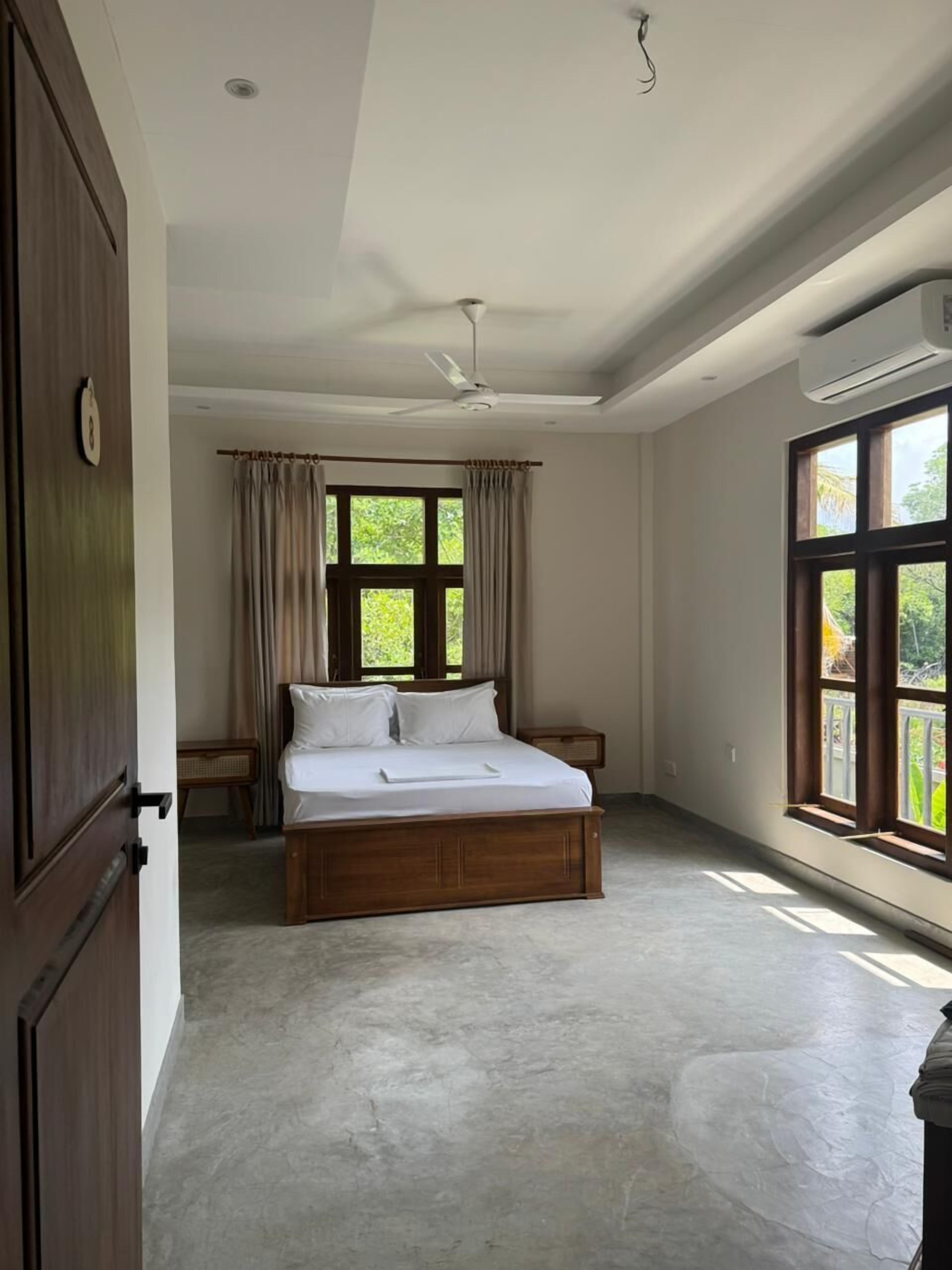 Kahden hengen perhehuone, näköala laguunille | Työpöytä, kannettavalle tietokoneelle sopiva työtila, ilmainen Wi-Fi