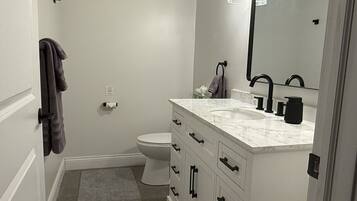 Hair dryer, towels, soap, shampoo