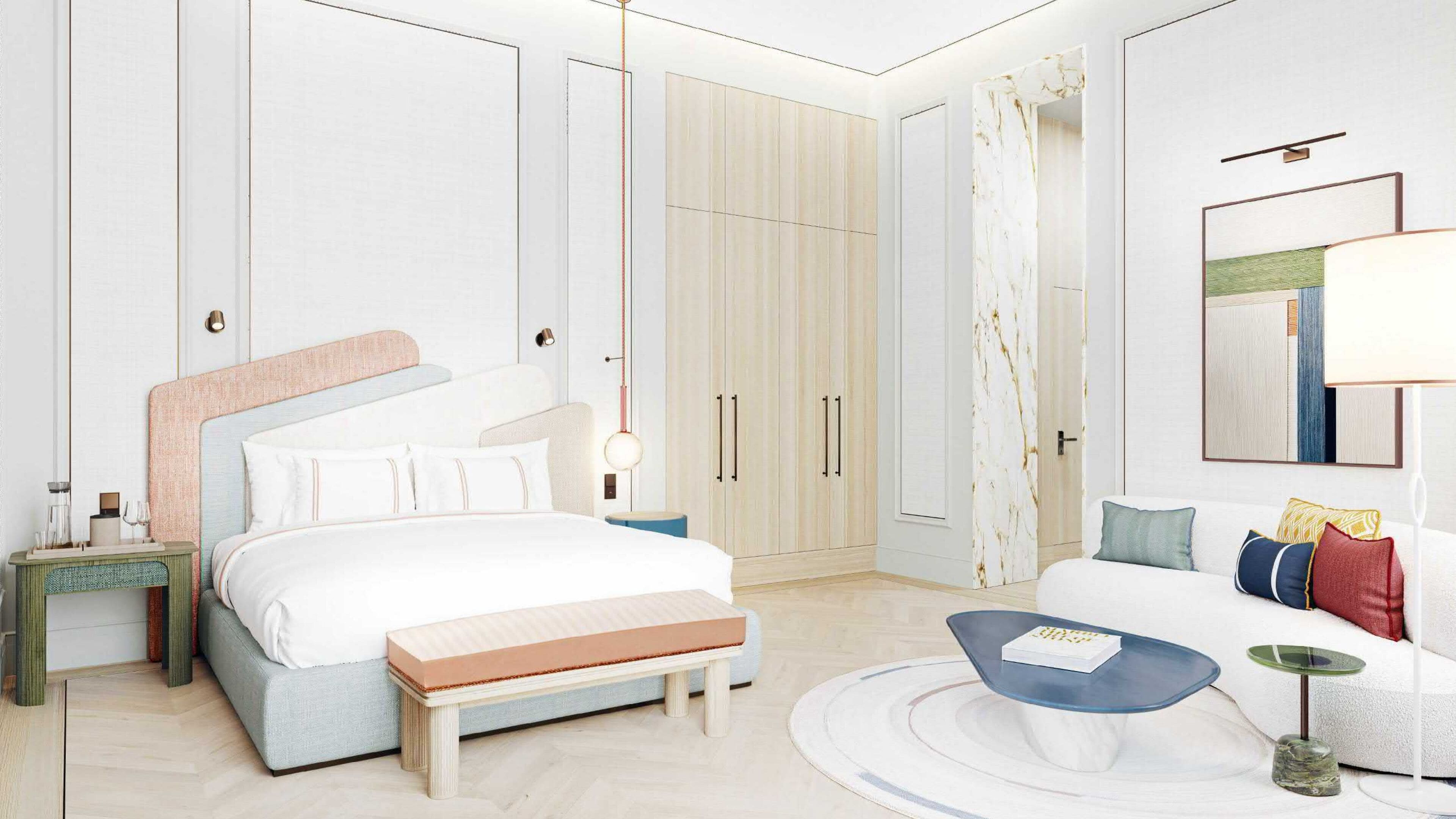 Een minibar, een kluis op de kamer, een bureau, geluiddichte muren