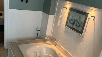 Jetted bath, hair dryer, towels, soap