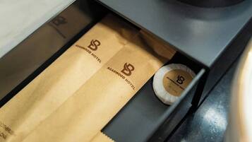 Shower, hair dryer, towels, shampoo