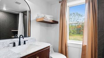 Shower, hair dryer, towels