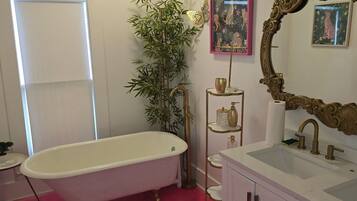 Shower, towels, soap, toilet paper