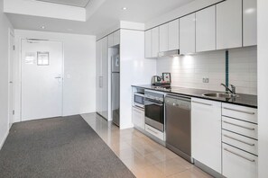 Apartment, 1 Bedroom, Balcony, Mountain View | Private kitchen | Fridge, microwave, oven, stovetop - Sierra Broadbeach - West Hinterland View (Broadbeach)