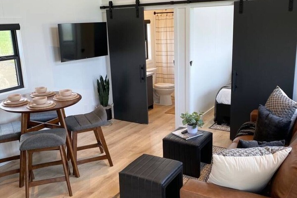 Curl up, unwind, and soak in the quiet charm of Tioga—your cozy corner for chill evenings.