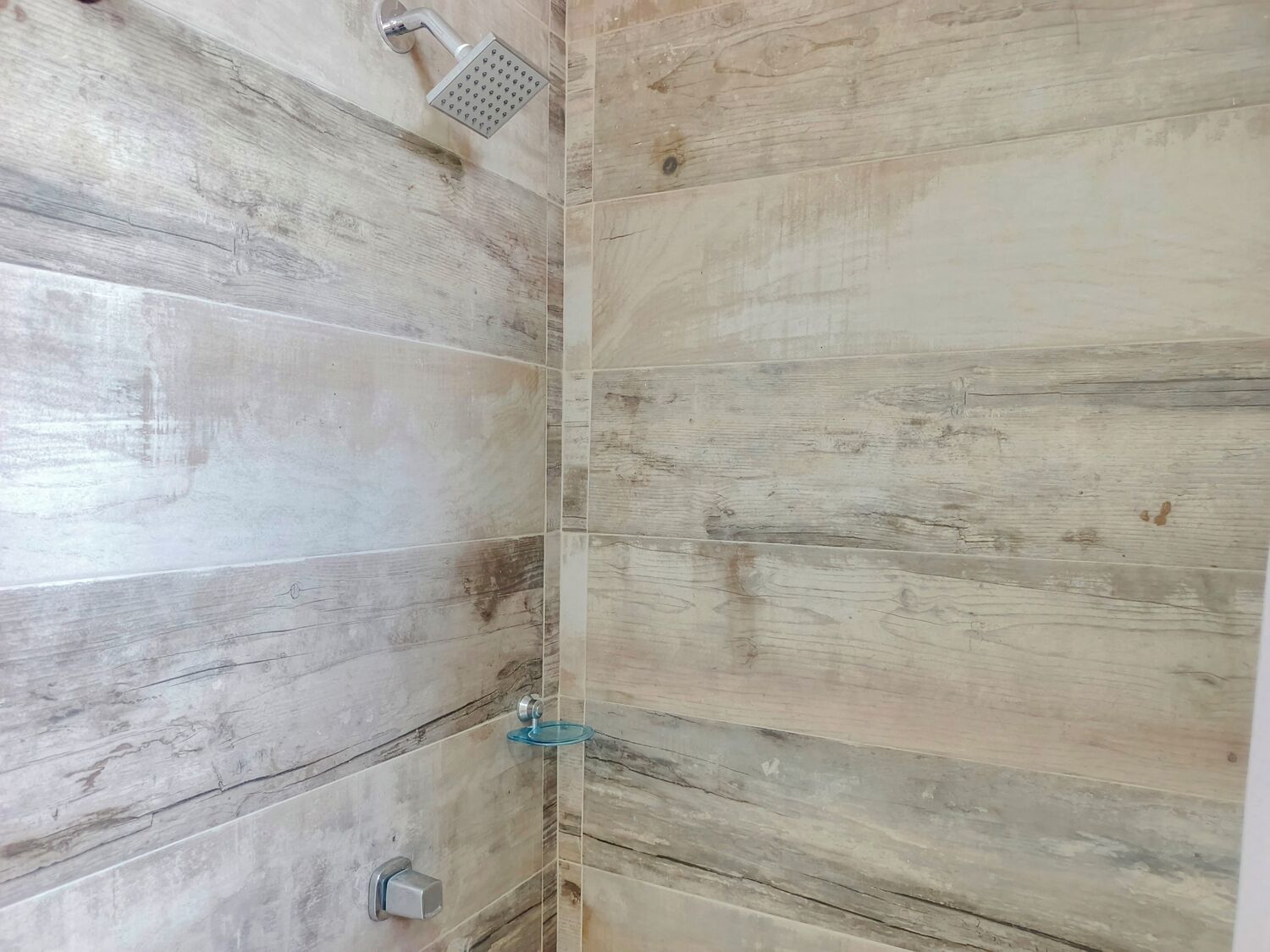 Shower, towels, soap, toilet paper