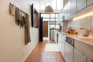 Vila família, sacada, vista para o pátio | Cozinha privada