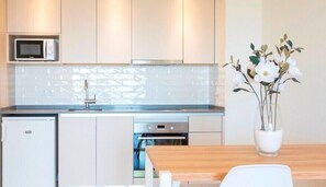 Apartment, 1 Bedroom, Partial Sea View | Private kitchen | Mini-fridge, microwave, oven, stovetop
