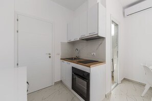 Apartment | Private kitchen - Apartment With AC and Balcony Golem (Golem)