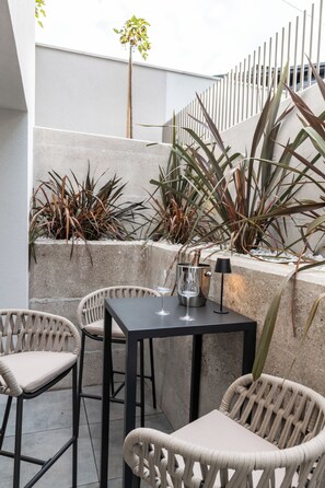 Suite Deluxe, cocina | Terraza o patio