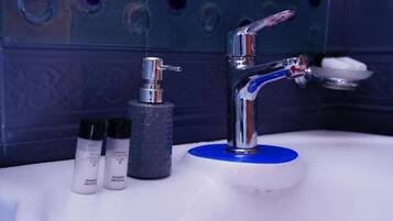 Shower, free toiletries, hair dryer, towels