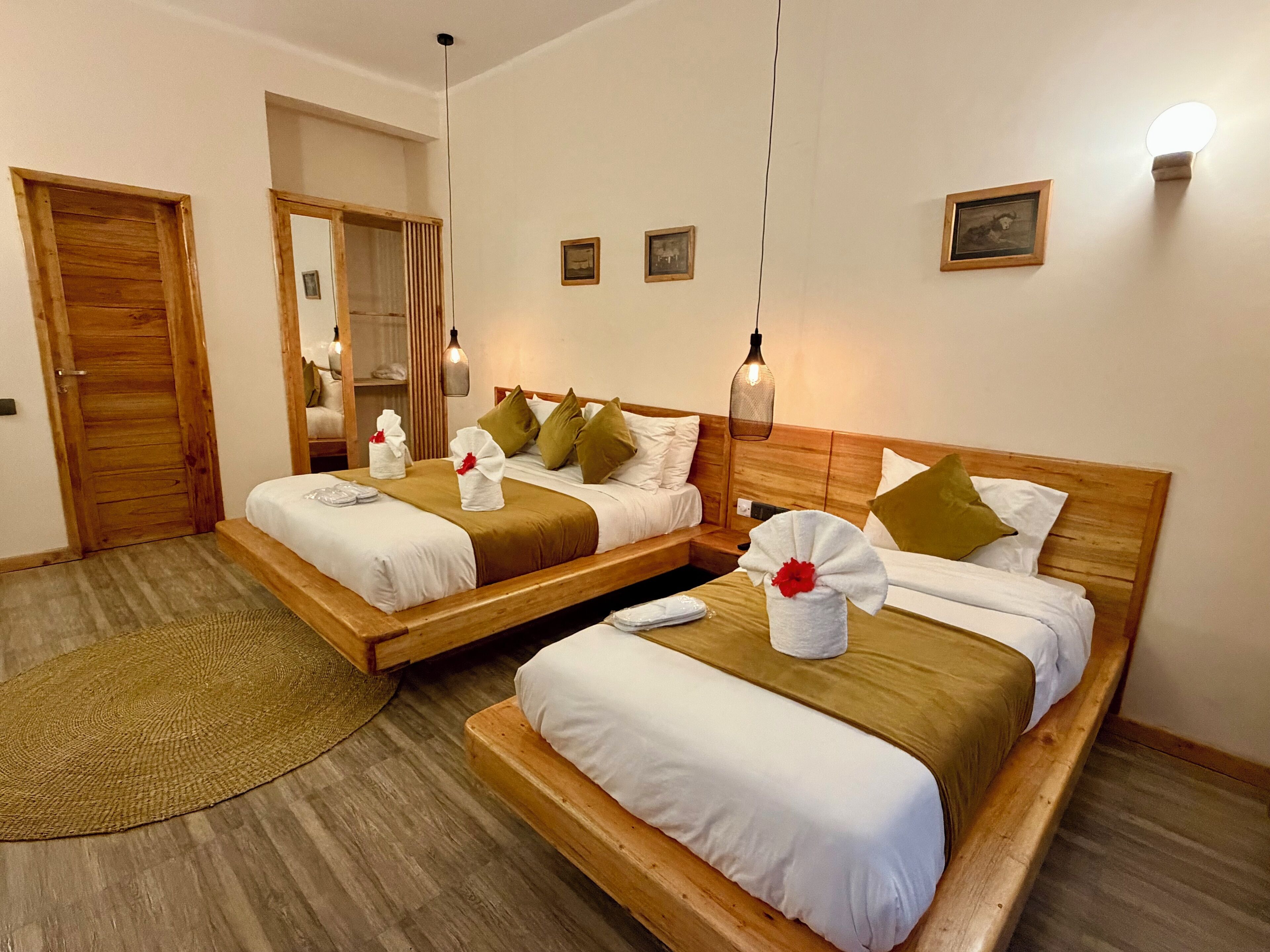 Luxury Triple Room, Pool View | In-room safe, desk, laptop workspace, soundproofing