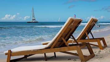 Na praia, toalhas de praia